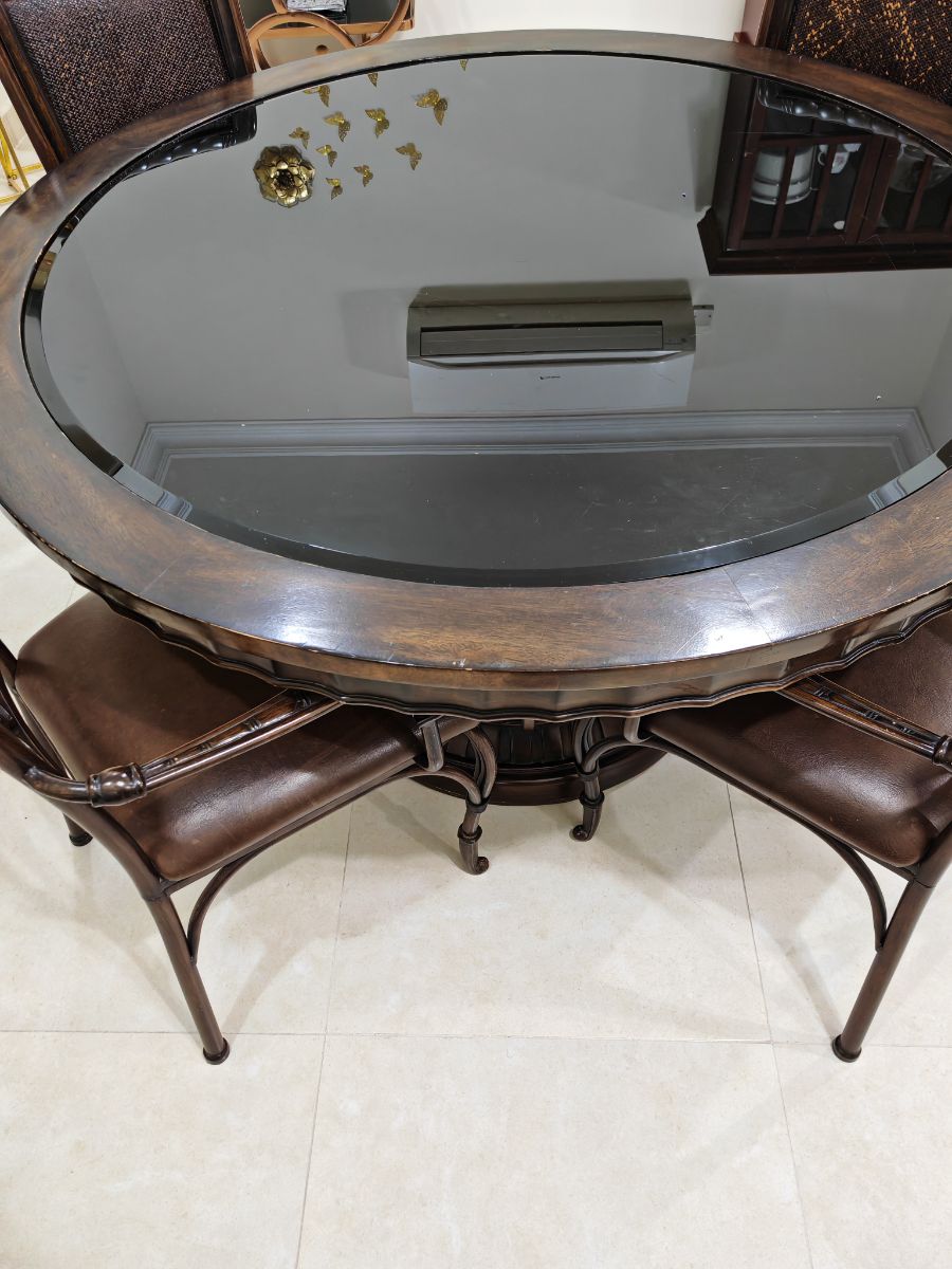 Dining table round  with 4 chairs - 1500 QAR( special design piece), top glass ,special wood & strong steel frame - Image 2
