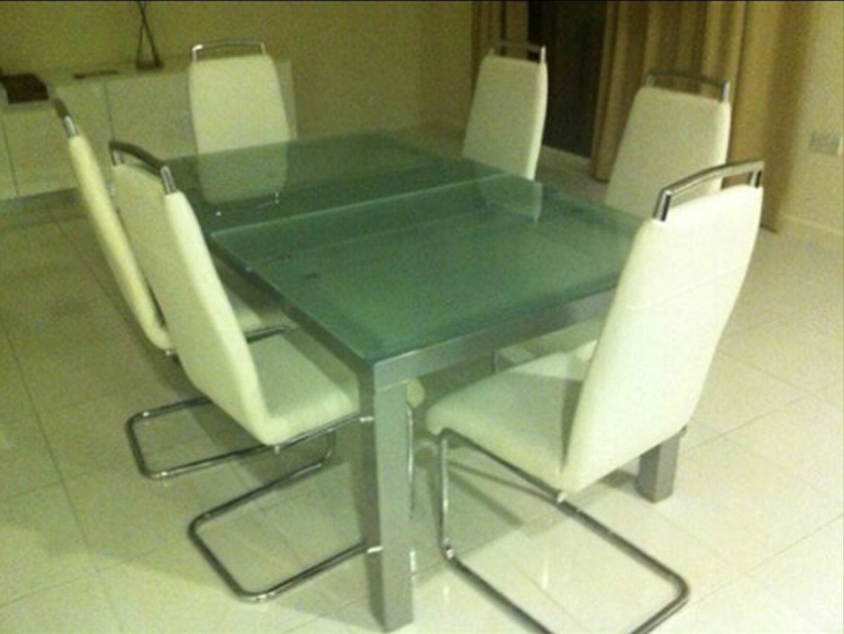 Heavy extendable tempered glass Dining table with 6 chairs & buffet - Image 1
