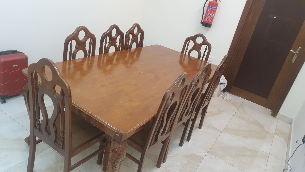 Urgent sale: Wooden Dining Table with 8 Chairs - Image 3