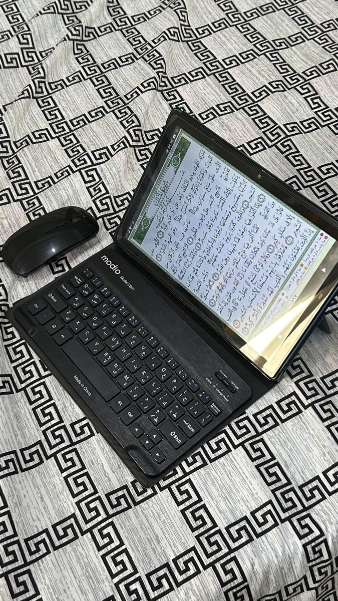 Modio tablet with mouse, keyboard, protective cover, screen protector, and charger. Specifications: 512GB storage, Android 13, powerful and capable of handling many applications. Used for only one month. Reason for selling: Lack of use. Price: 350 qr - Image 5