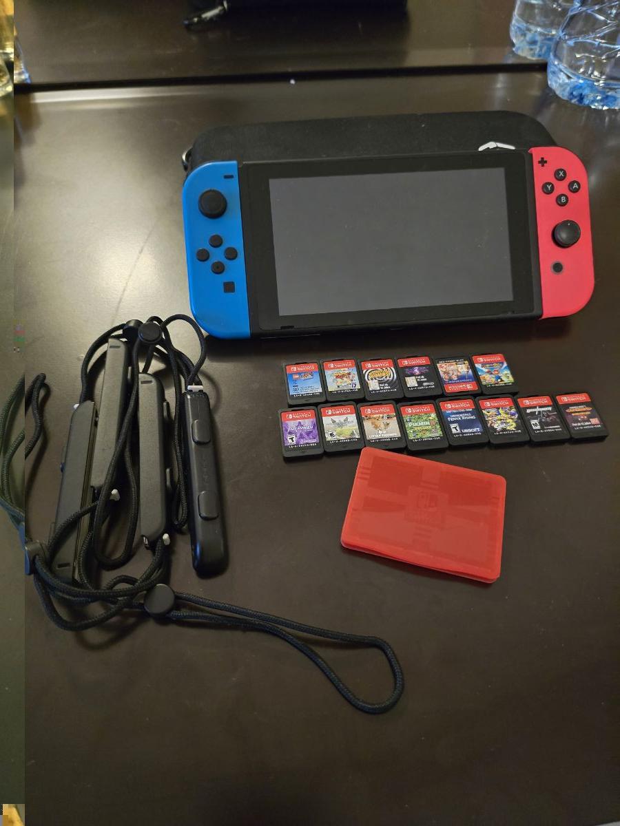 Nintendo switch v2 + 14 games - Image 1