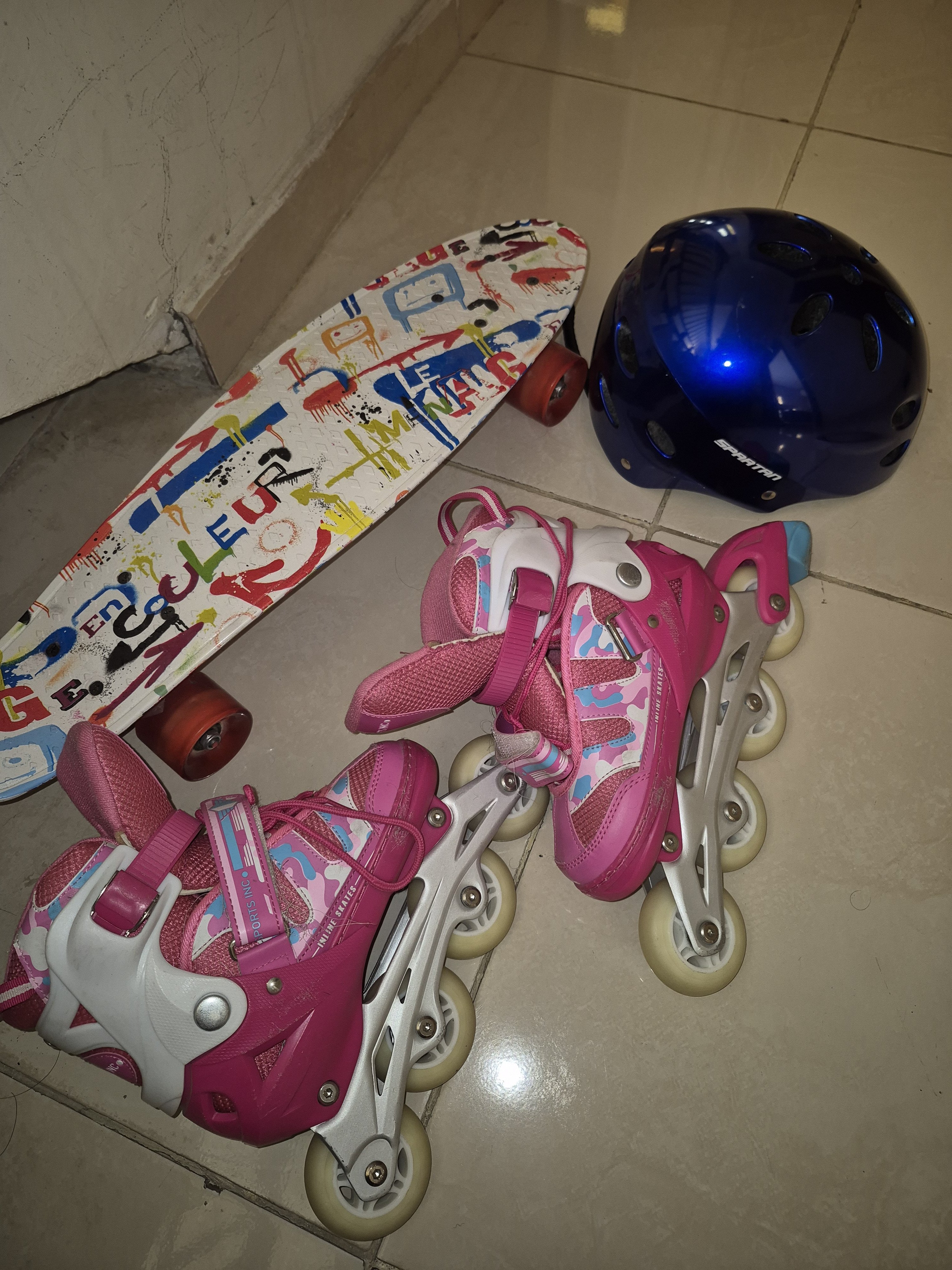 Roller blades, skate board, helmet - Image 1