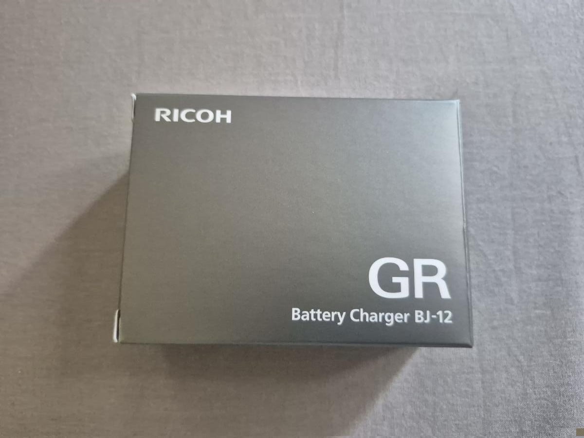 Ricoh RJ-12 Charger for GRIV Camera - Image 1