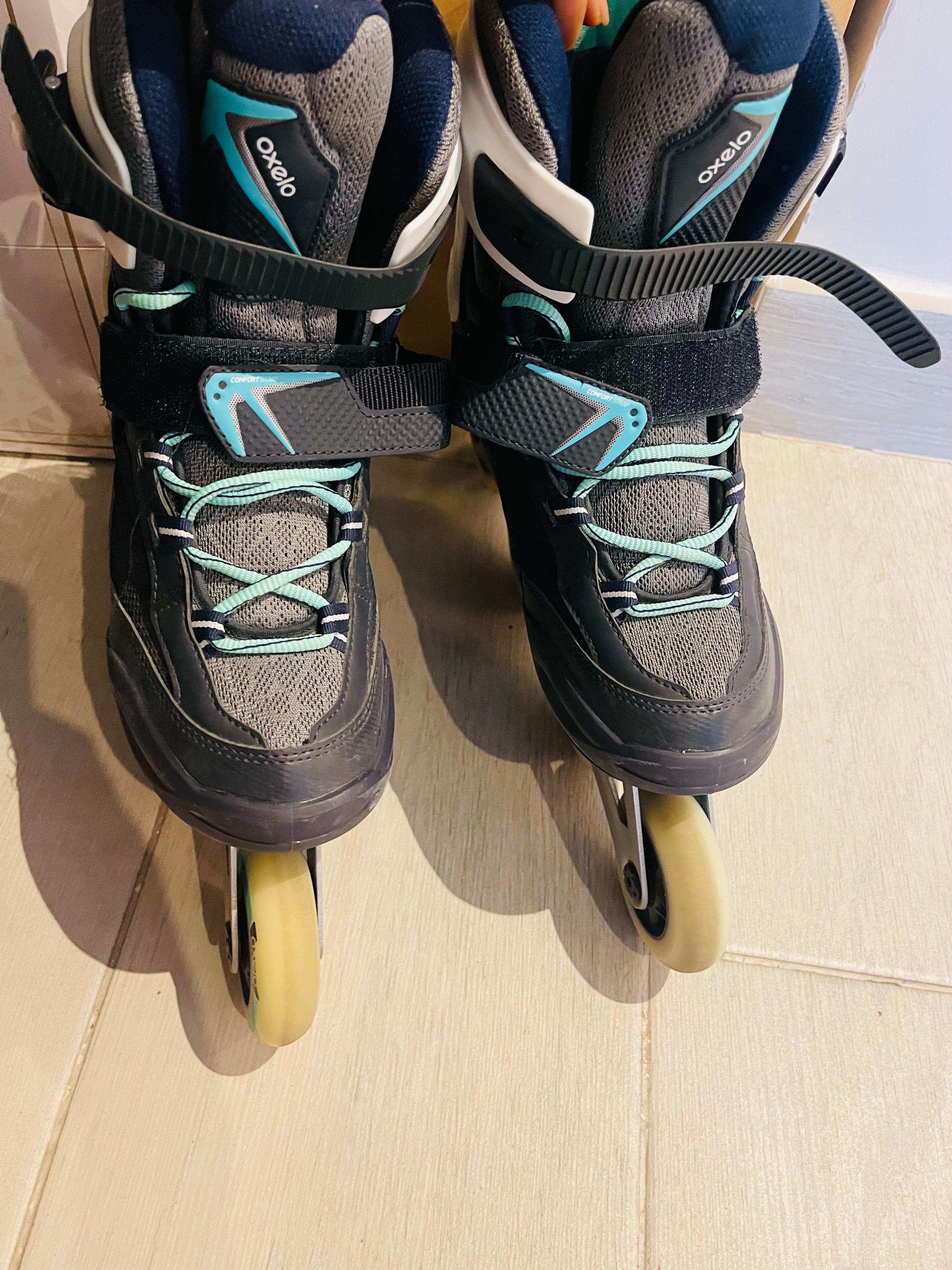Roller skates and board - Image 1