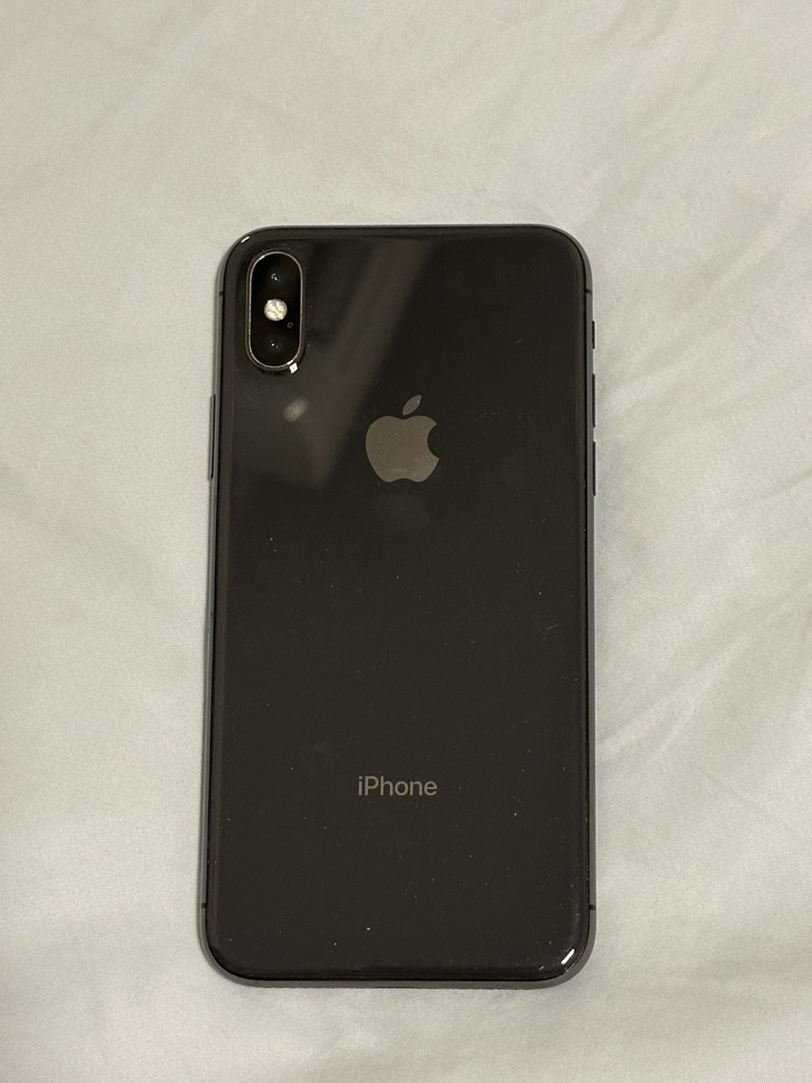 iPhone X (256GB) with an original Apple Smart Battery Case - Image 1