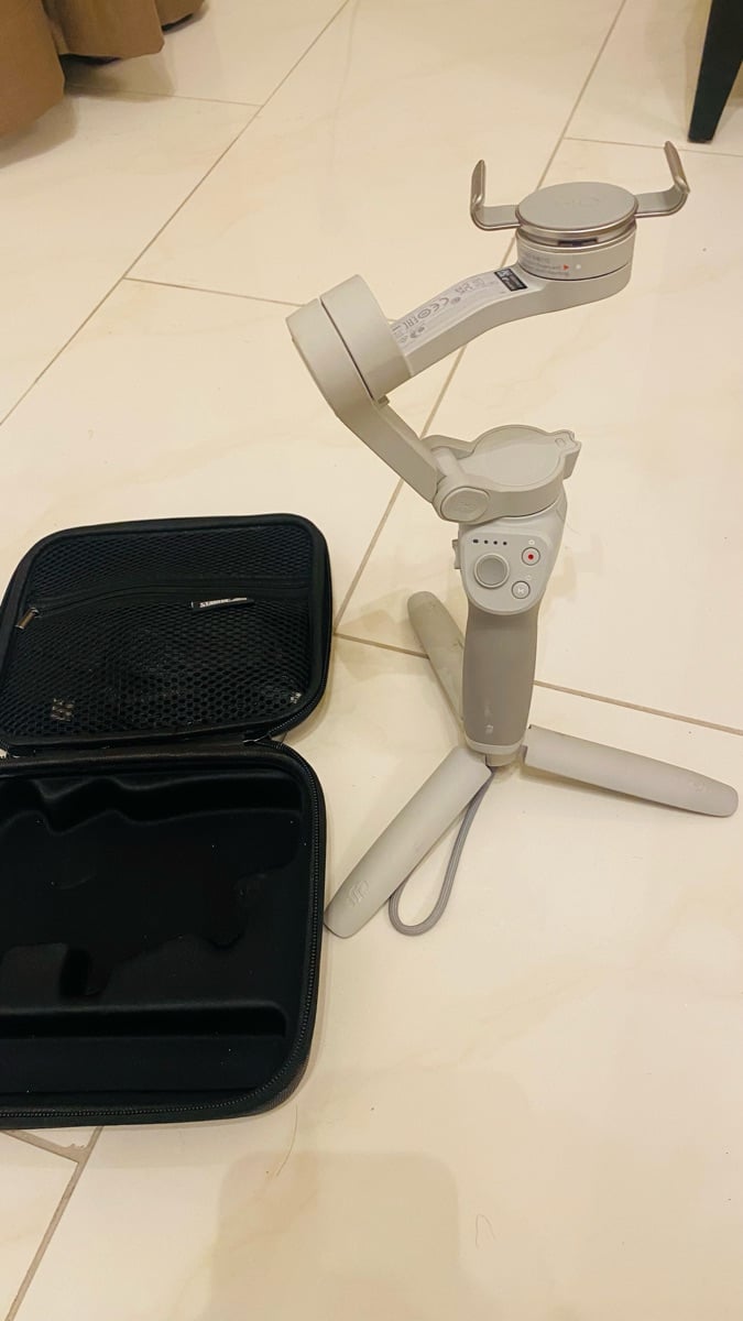 DJI OSMO 4 handheld gimbal with a hard case - Image 2