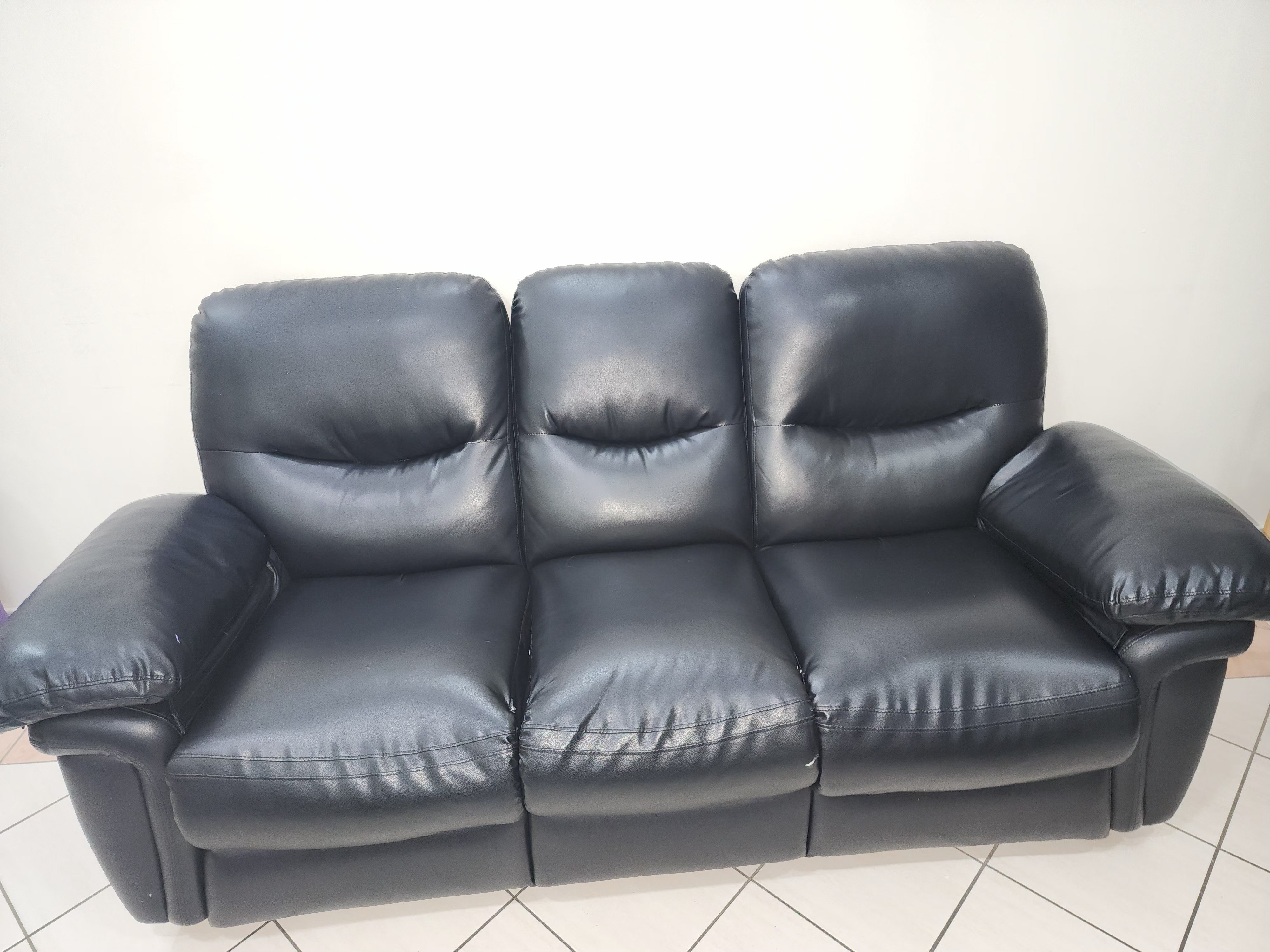 Leather reclyning 2 seater and 5 seater sofa in good condition - Image 2