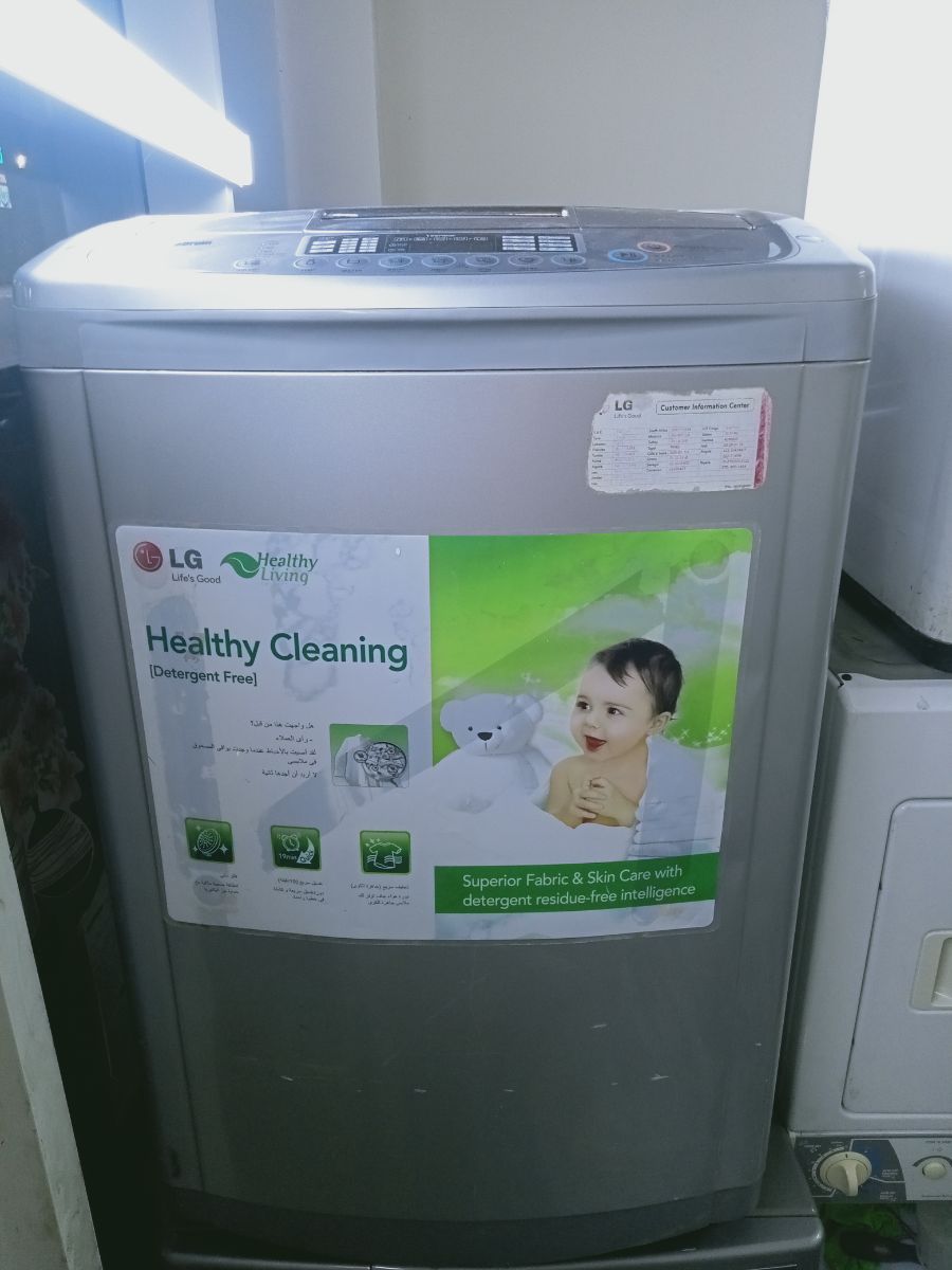 LG 12 kg top load washing machine for sale - Image 1