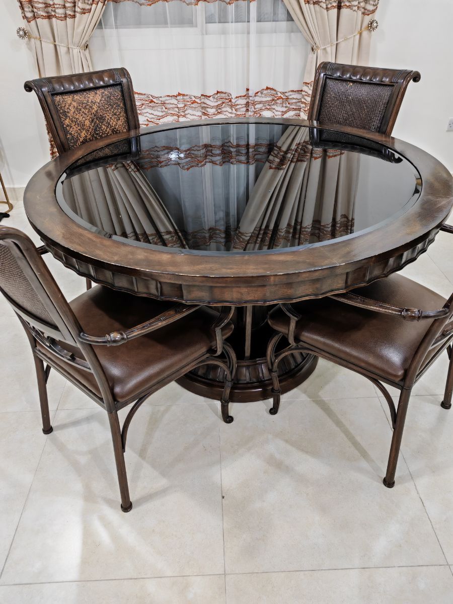Dining table round  with 4 chairs - 1500 QAR( special design piece), top glass ,special wood & strong steel frame - Image 3