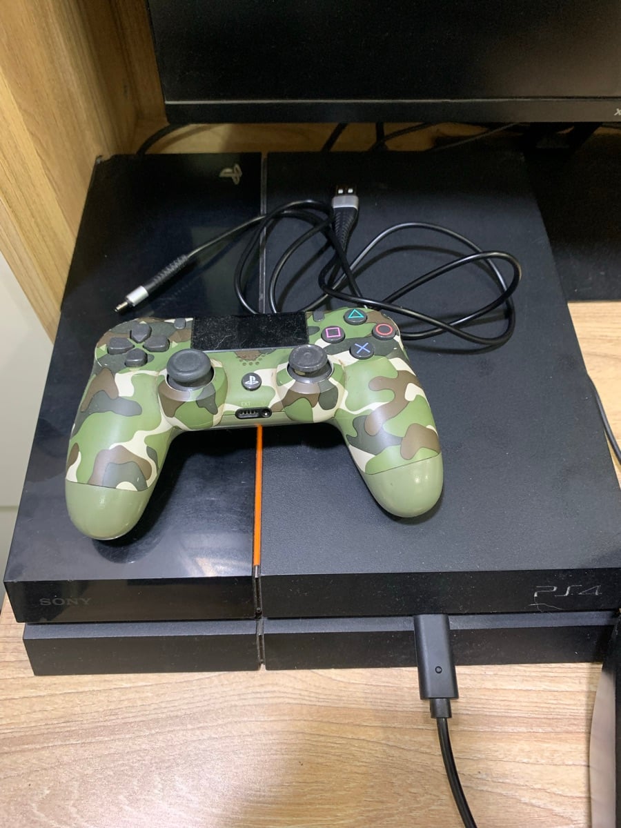 PS4 (with controller and charger) - Image 1
