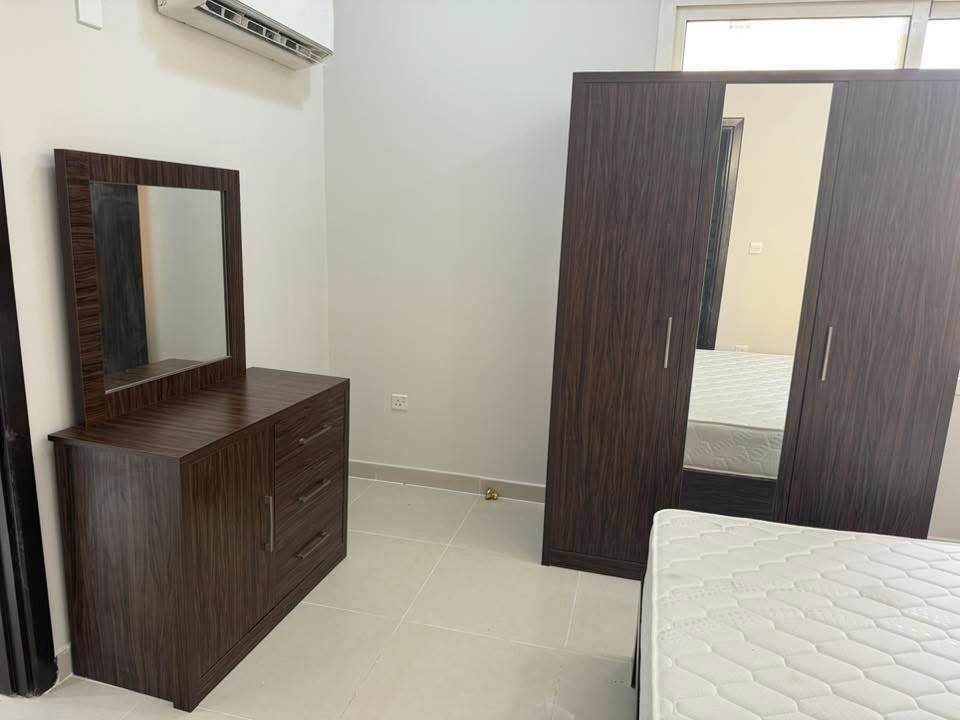 Urgent Sale King Bedroom set 1450 Qr  Wardrobe  Bed (No mattress) 180*200cm  2 Side table  Dressing mirror  Perfect condition all items  Pick up Location Al Thumama area  Contact on WhatsApp 30306762 - Image 2