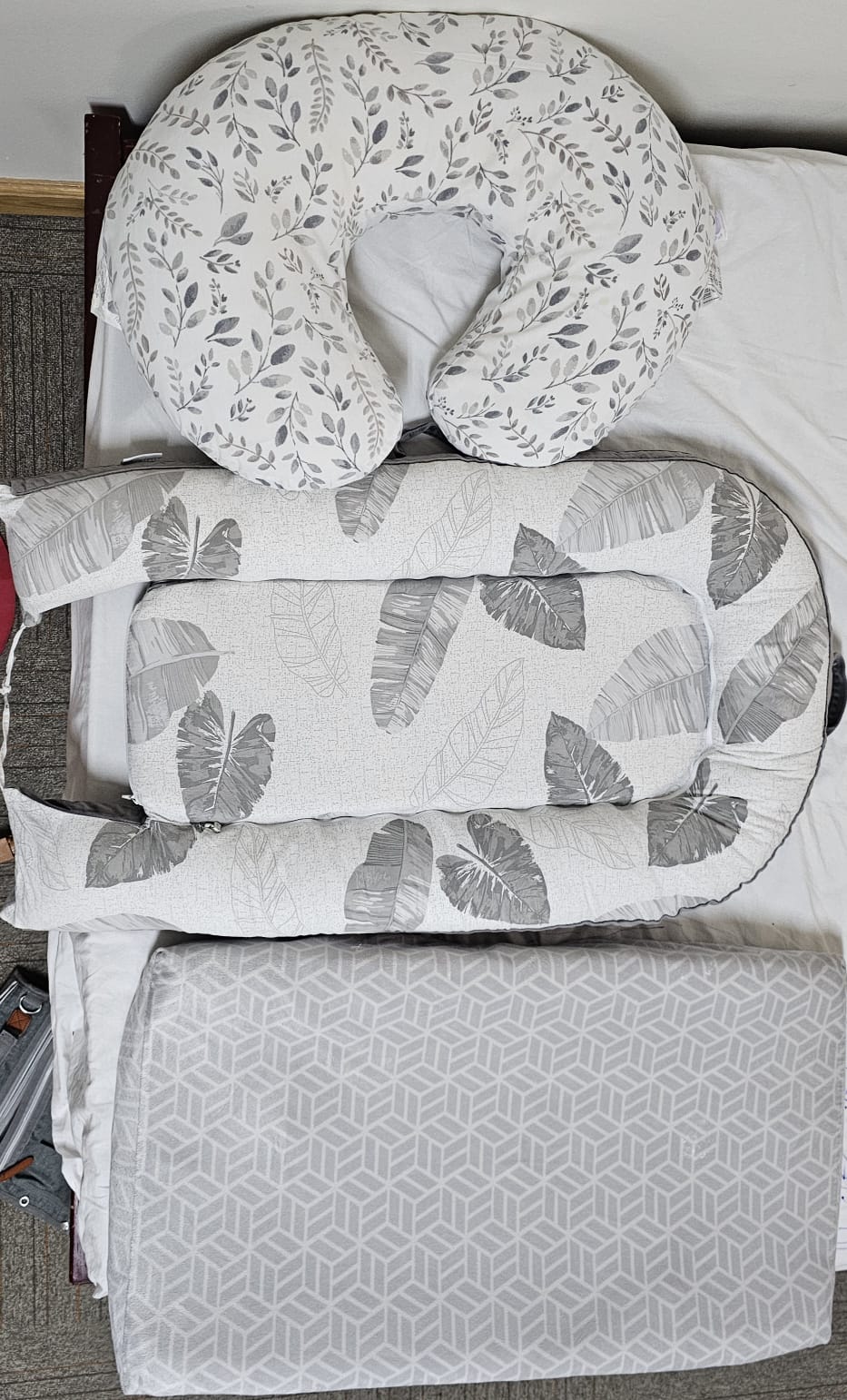 Three baby items: feeding pillow (brand boppy), lounger, changing mat, each with cover - Image 1