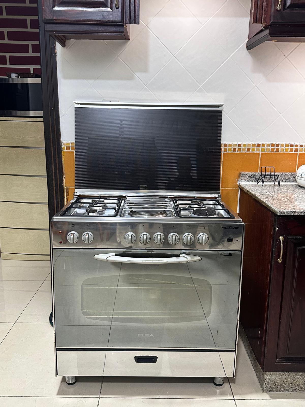 gas stove with 2 electric plates and electric oven for sale