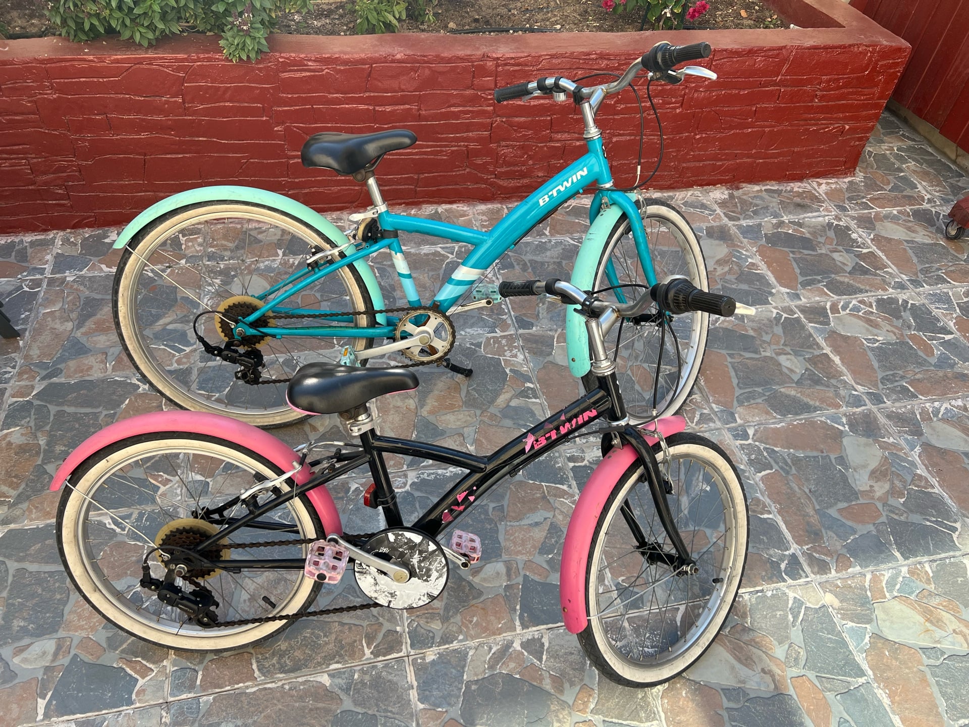 BTWIN bikes and one Roller blades from Decathlon Qatar with helmets - Image 1
