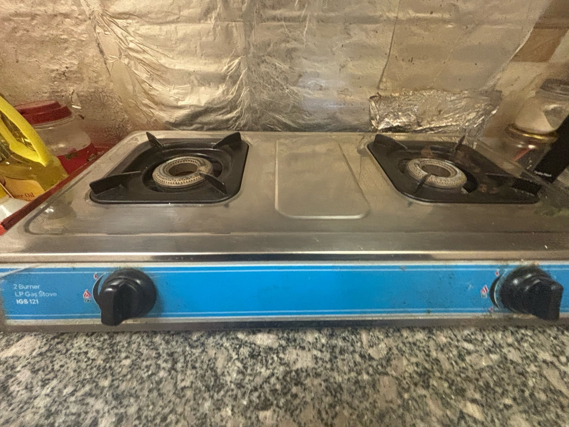 Moving sale - Gas cylinder and stove with regulator, plastic table and chair - Image 1