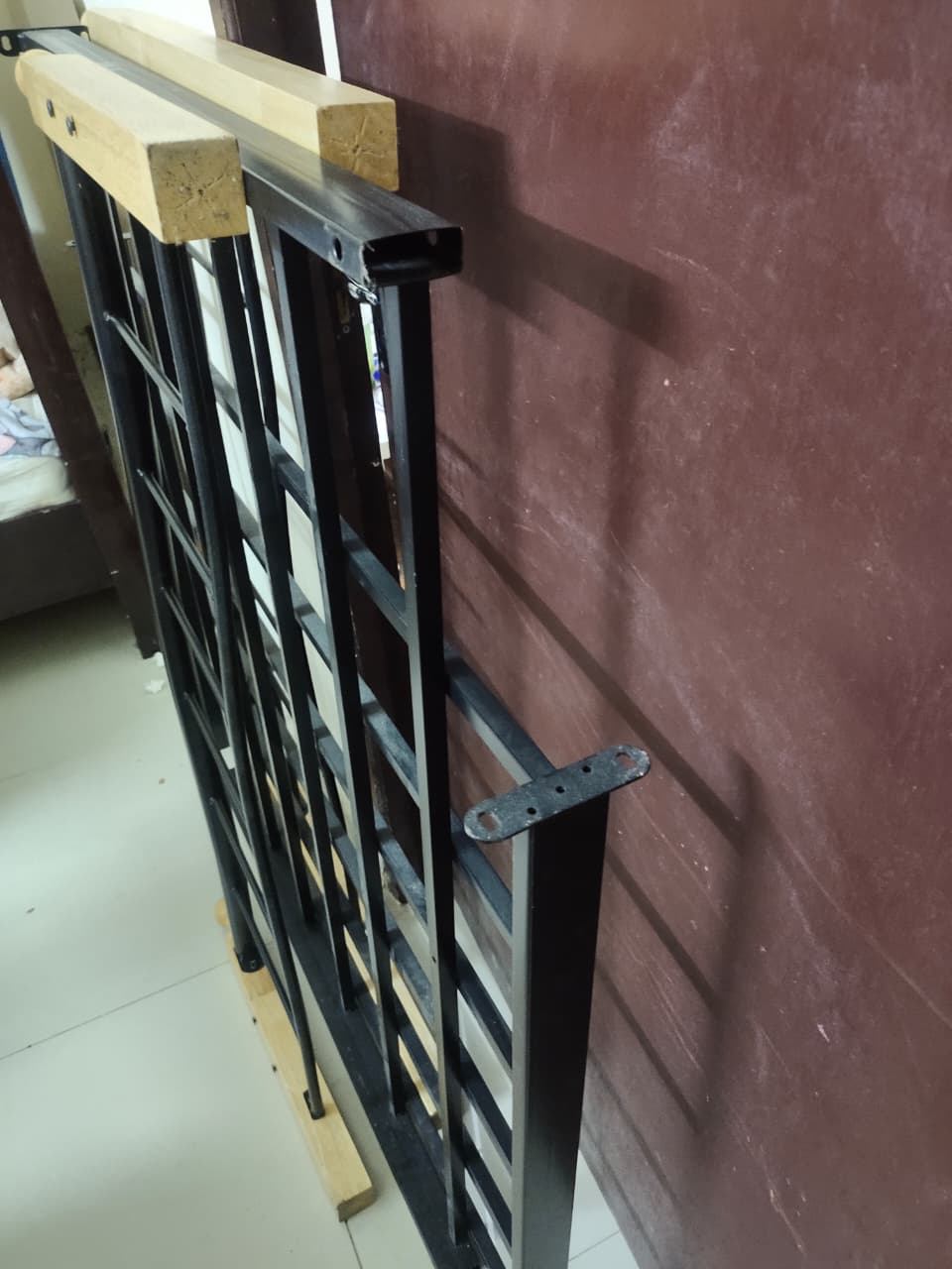 Sturdy Metal Bed Frame with Wooden Finish – Almost New (No Mattress) - Image 3