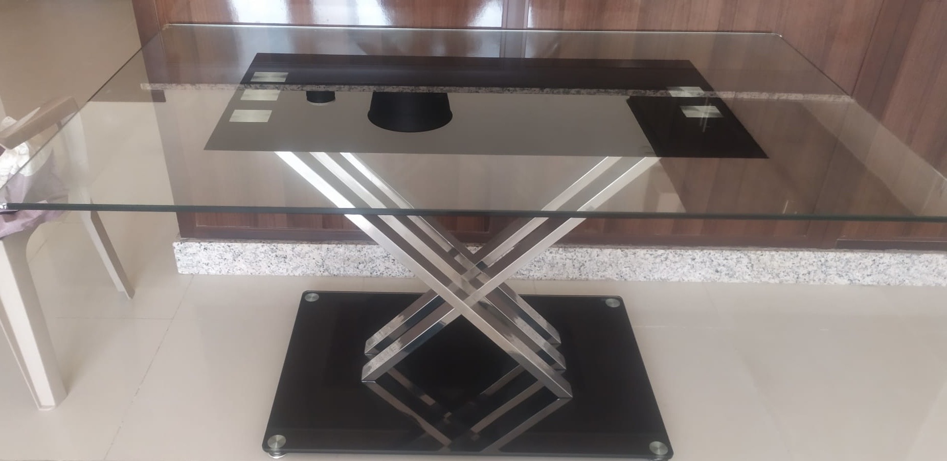 Dining table only- Glass top dining table with string SS legs and glass base - Image 2