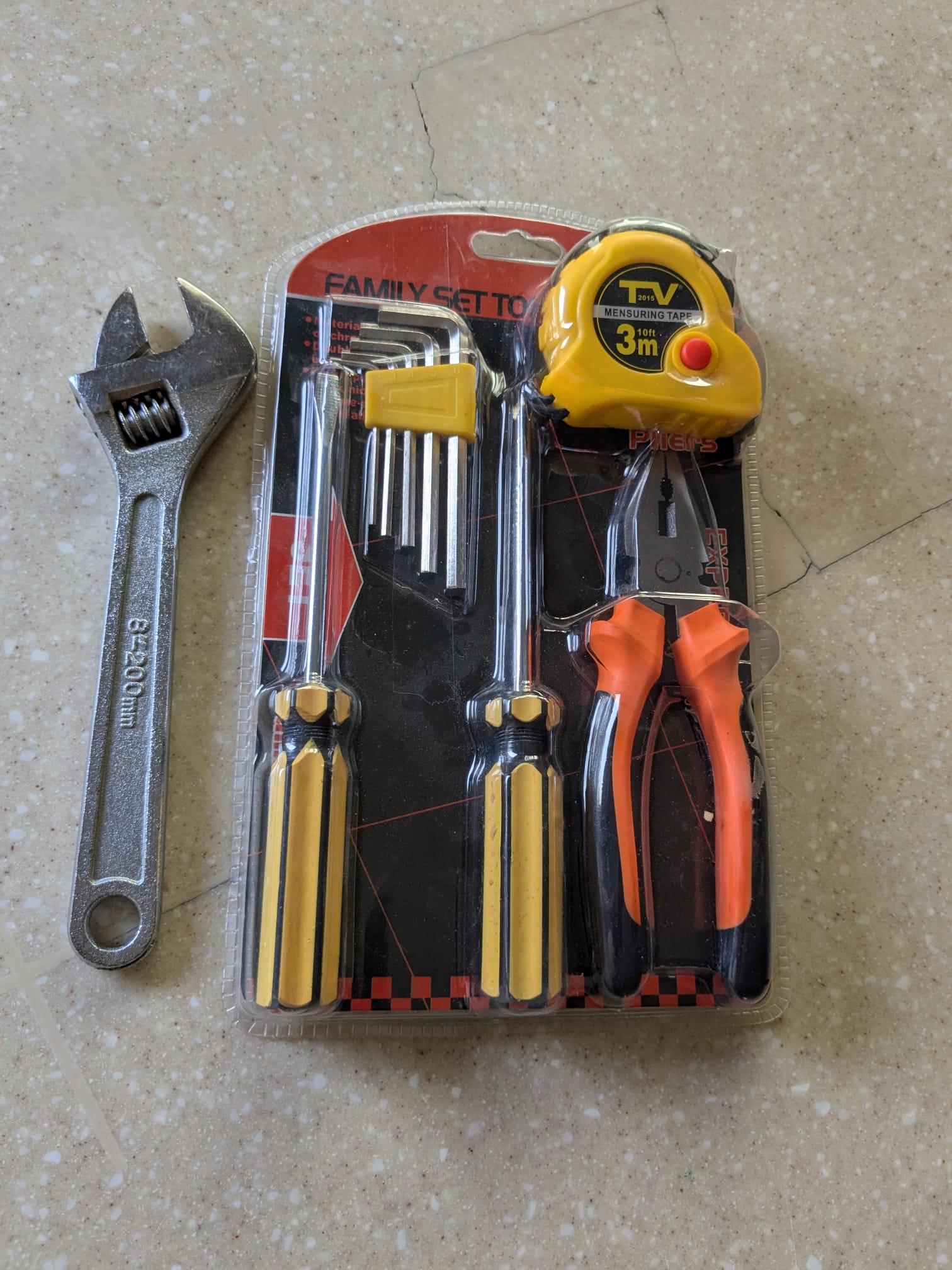 Basic DIY tool set in new condition with additional adjustable wrench. - Image 1