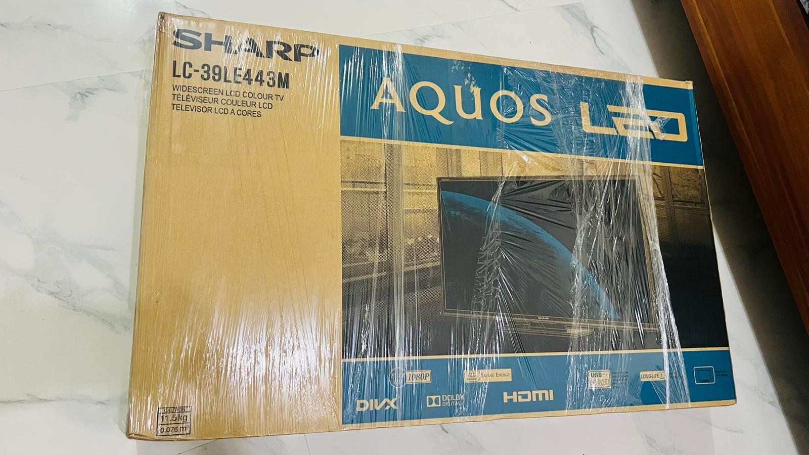 SHARP TV 39Inch with box and Remote - Image 1