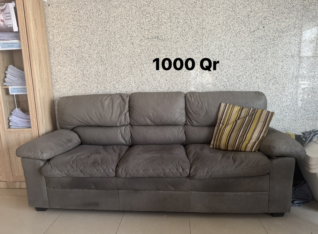 Sofa used in spare room in office - Image 1