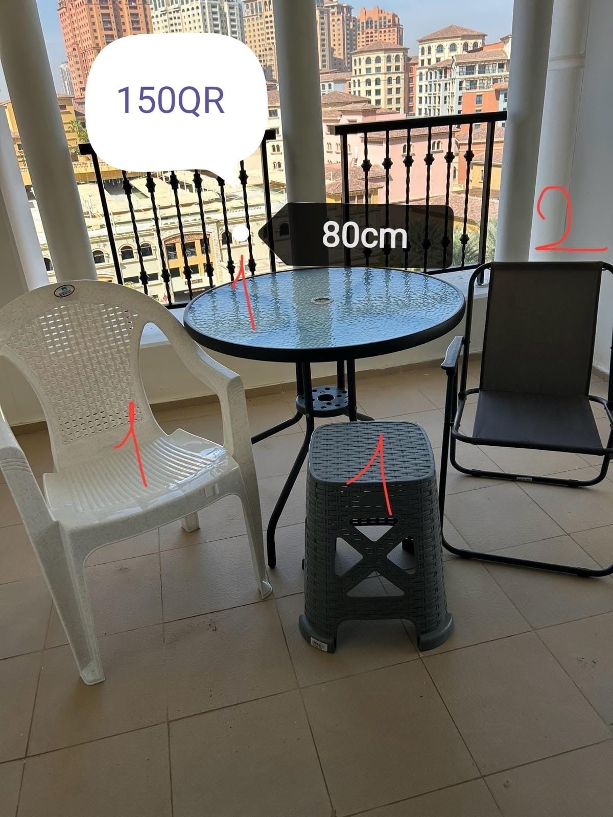 Table with 2 steel chairs, 1 plastic chair , and 1 stool plastic table - Image 1