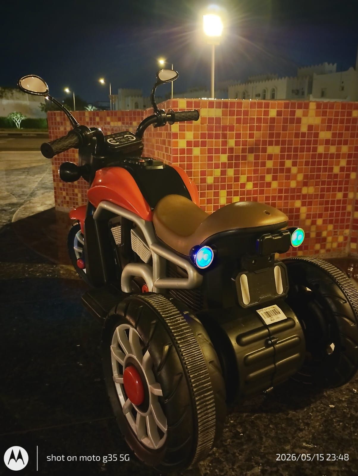 Kids Electric Ride-on Motorcycle with LED Lights & Music (Excellent Condition) - Image 2