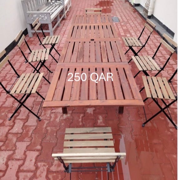 IKEA outdoor table with 8 chairs - Image 1