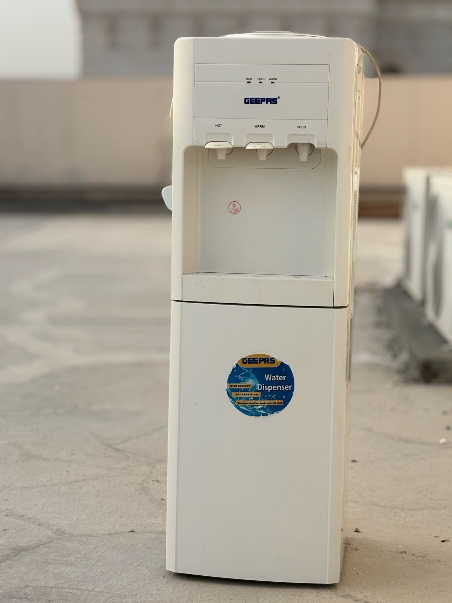Geepas water dispenser with storage cabin - Image 1