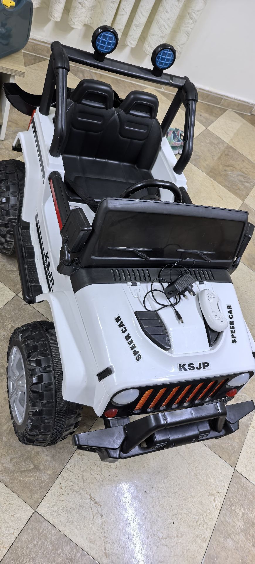 Battery operated Jeep almost new, rarely used with remote and charger. - Image 1