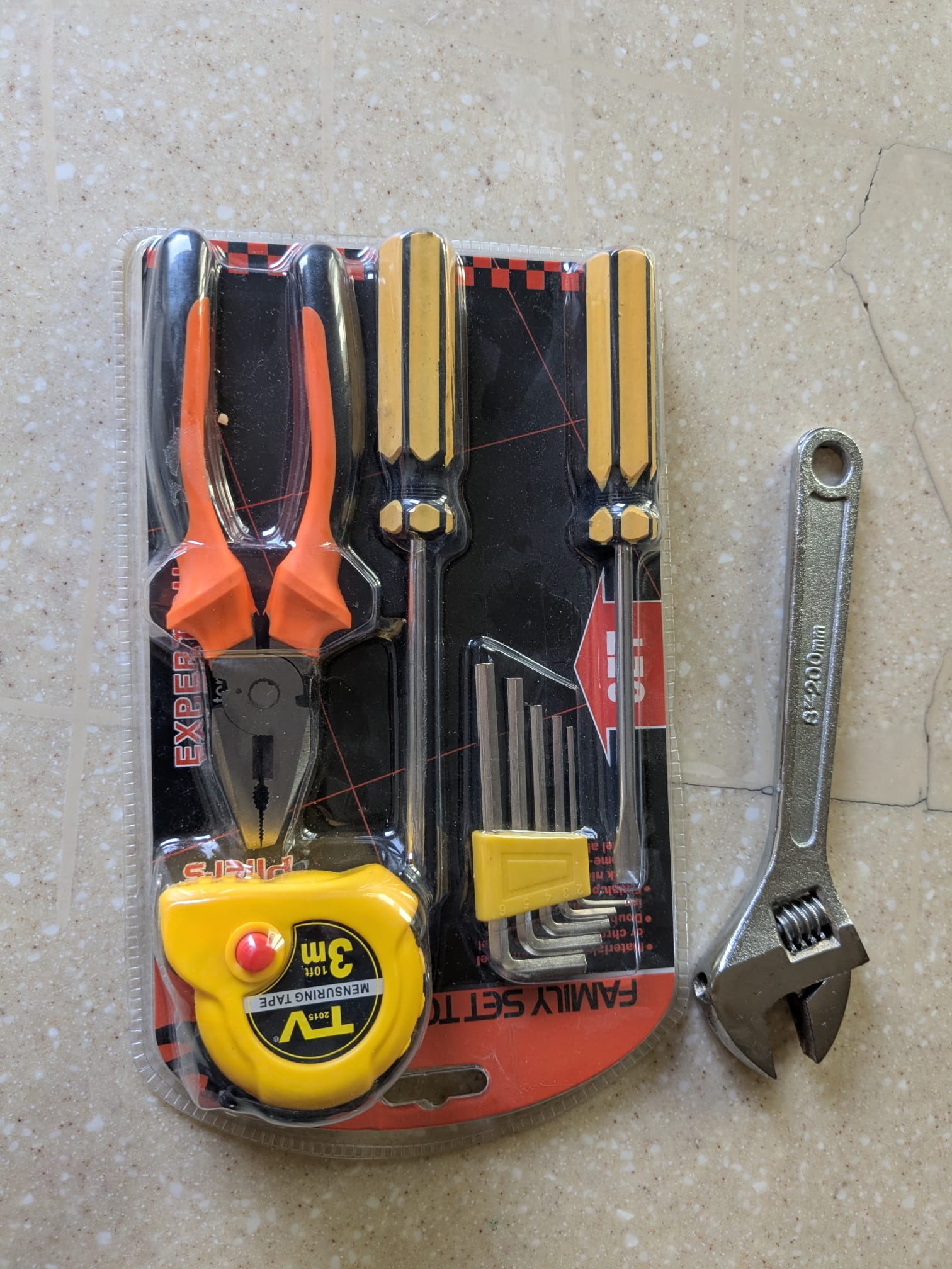 Basic DIY tool set in new condition with additional adjustable wrench. - Image 4
