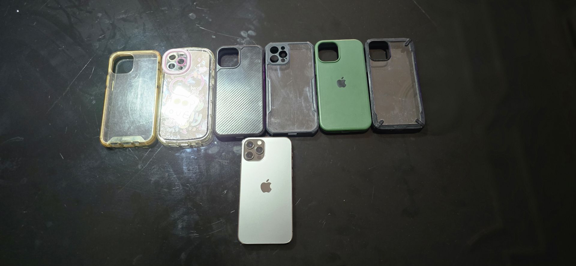 iPhone 12 Pro for sale 256 Gb with 6 cases - Image 1