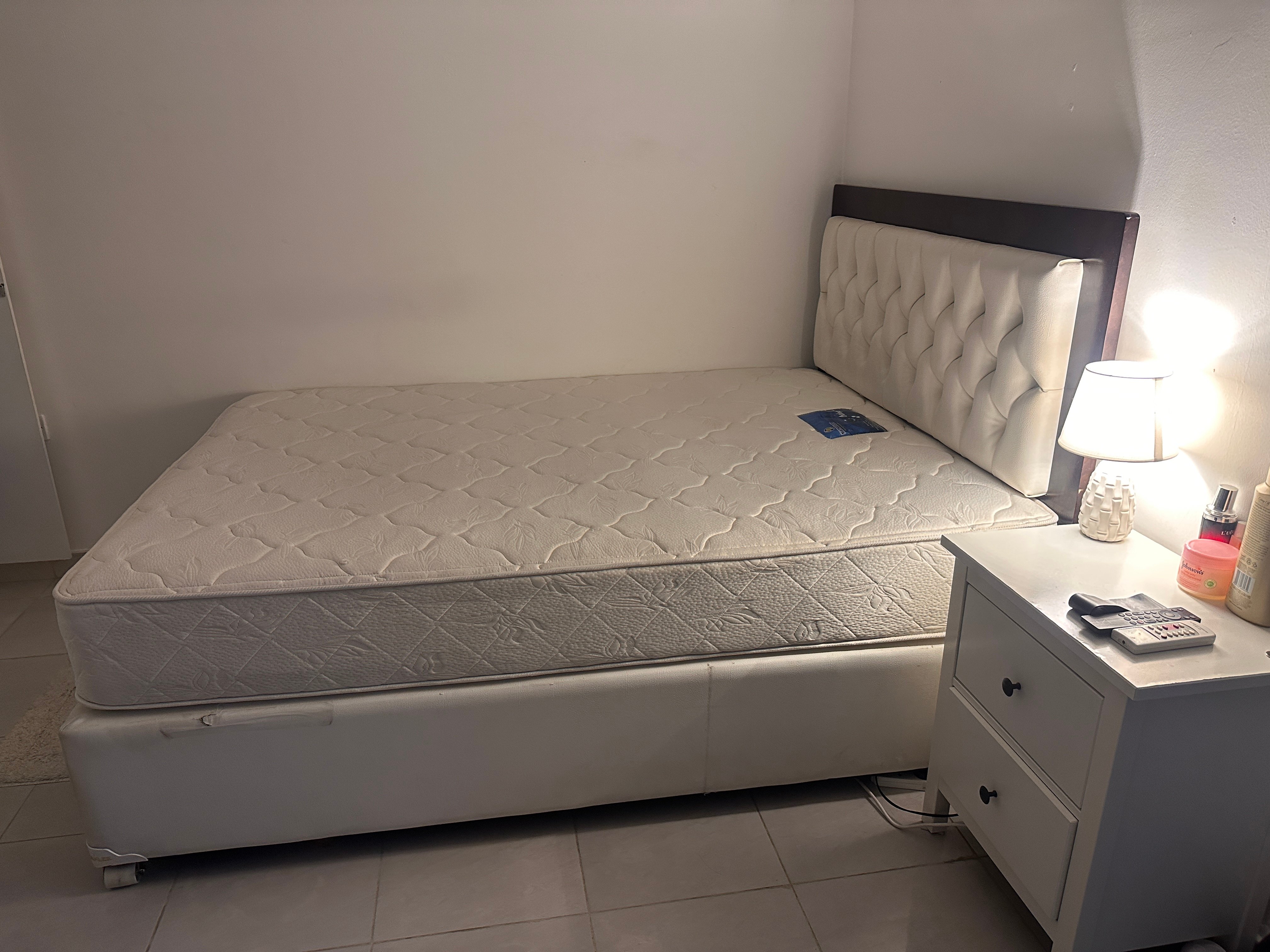 Bed and side table - Image 1