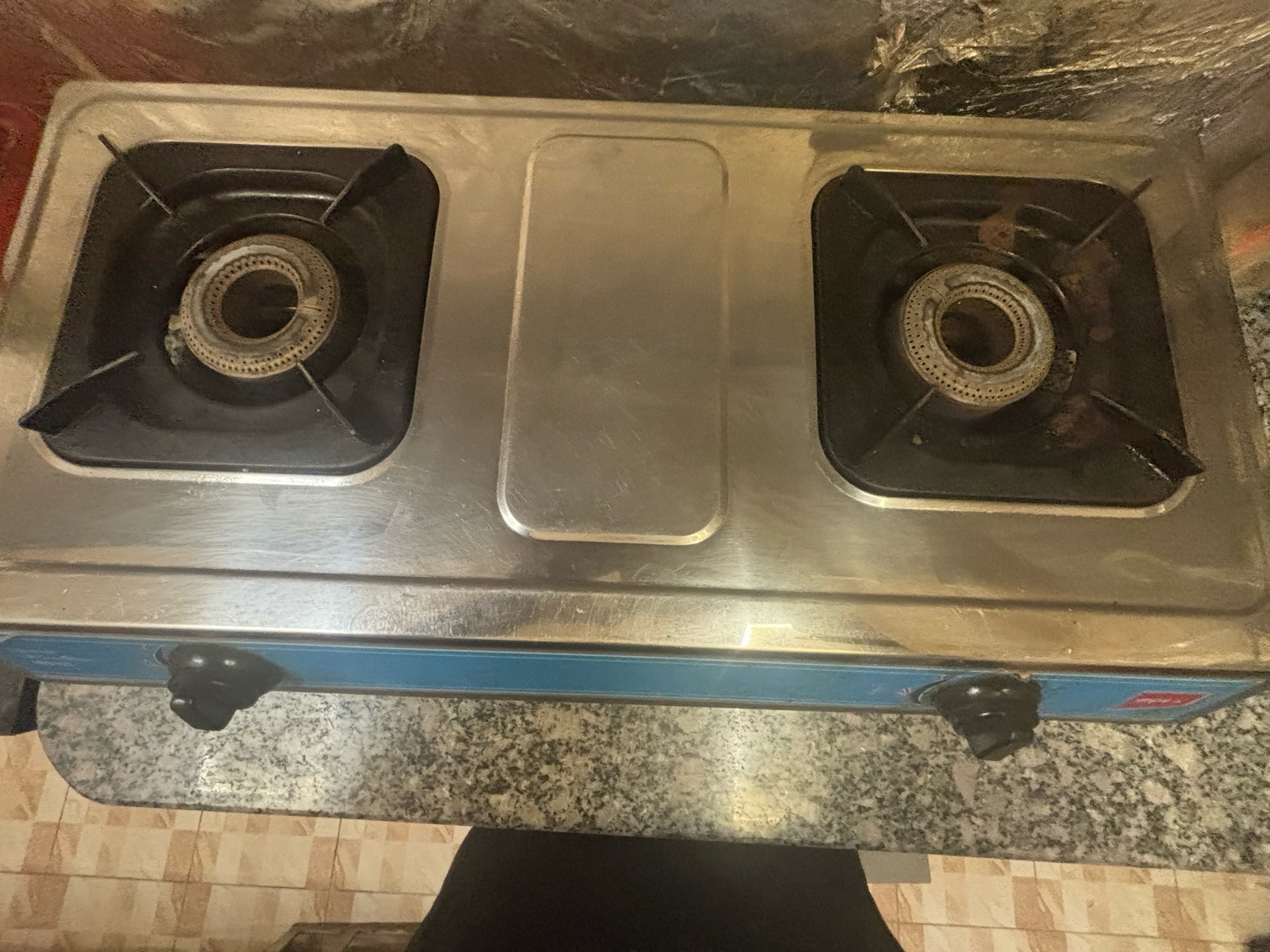 Moving sale - Gas cylinder and stove with regulator, plastic table and chair - Image 4