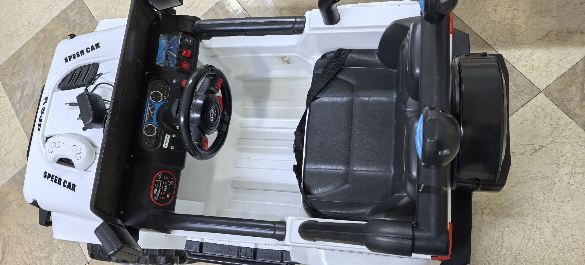 Battery operated Jeep almost new, rarely used with remote and charger. - Image 3
